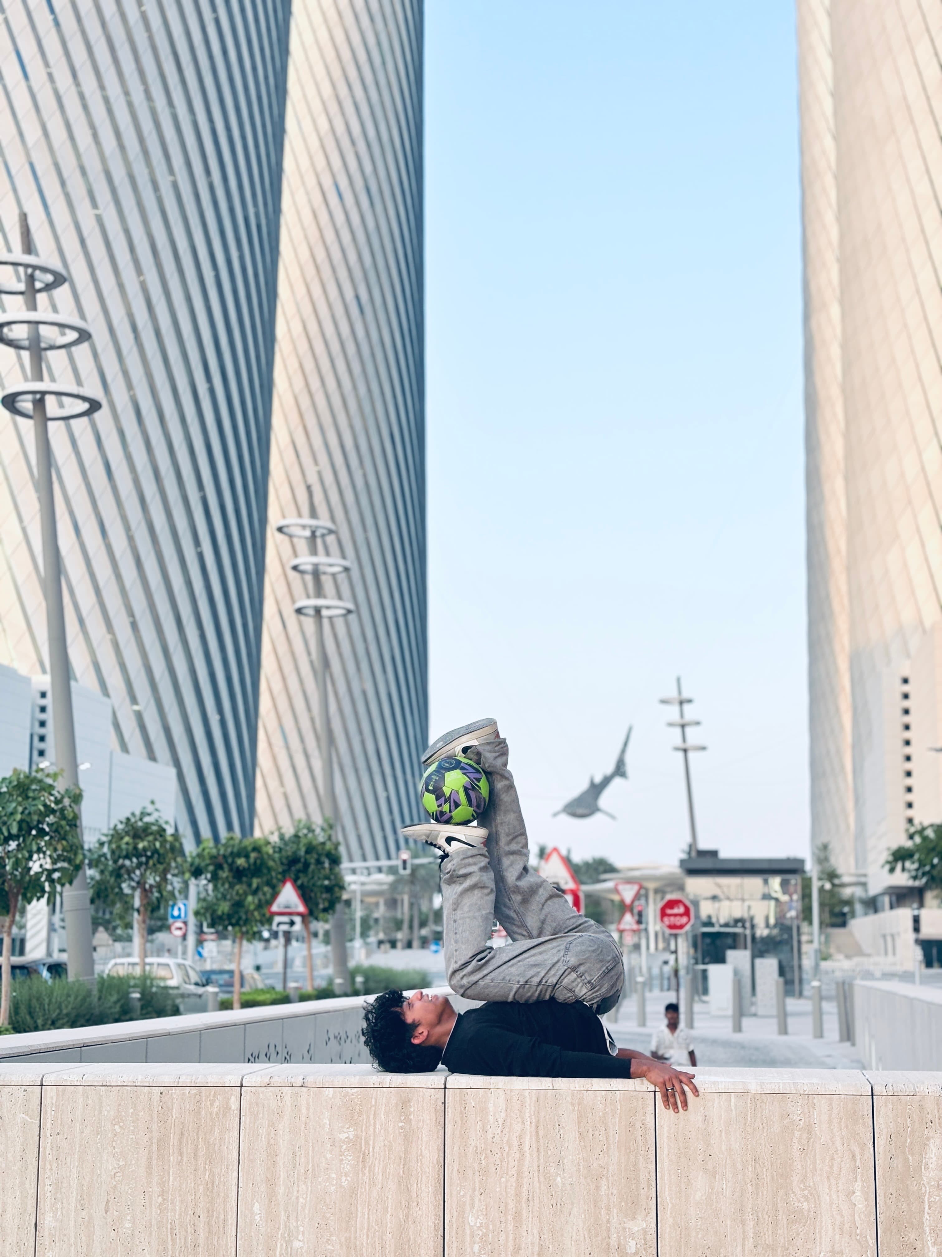 Freestyle pose against the West Bay Doha skyline